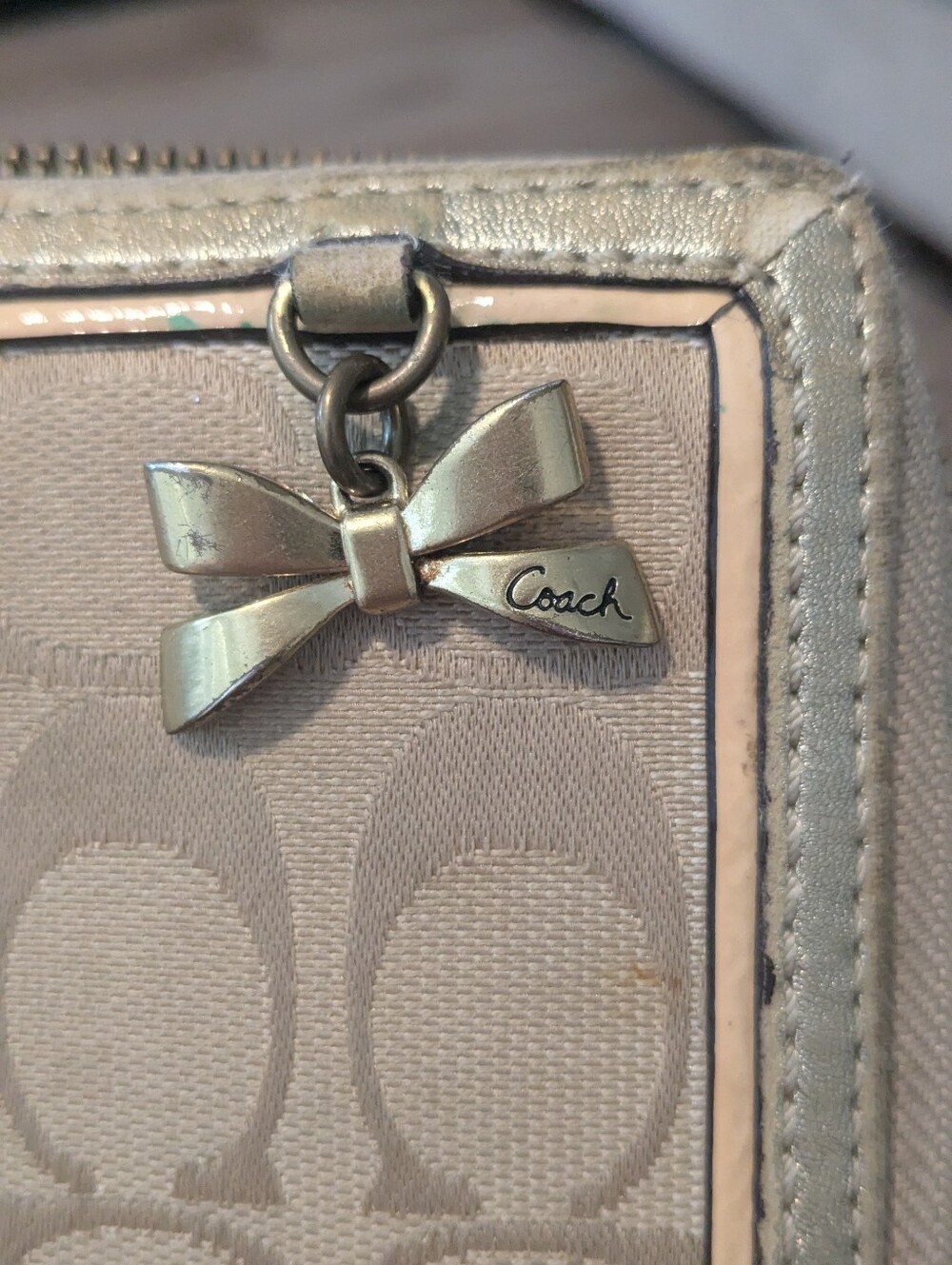 Coach Women's Bow Zip Wallet in Light Pink and Silver